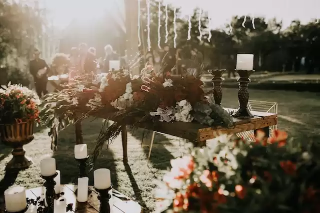 a decorative table at a garden wedding